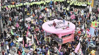Extinction Rebellion protesters block streets in central London