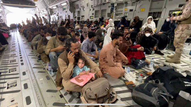 Refugees are evacuated from Hamid Karzai International Airport in Kabul