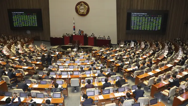 South Korea’s legislators attend a plenary session to proceed with pending bills at the National Assembly in Seoul