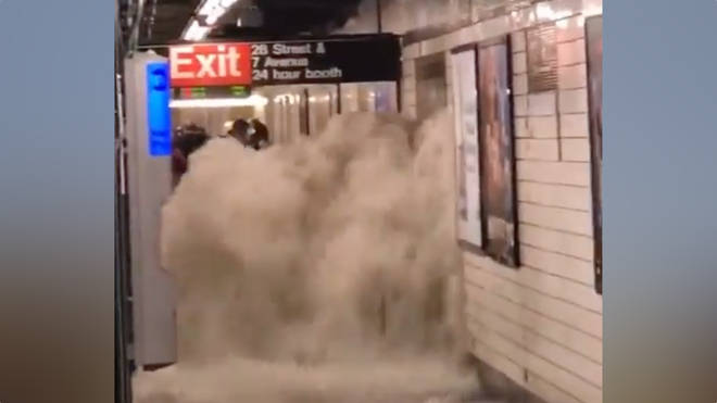Subways were submerged with gushing floodwater as torrential rain hit New York City