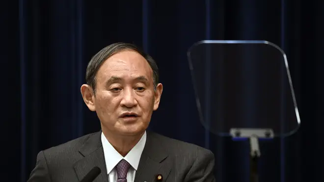 Japan’s Prime Minister Yoshihide Suga attends a news conference