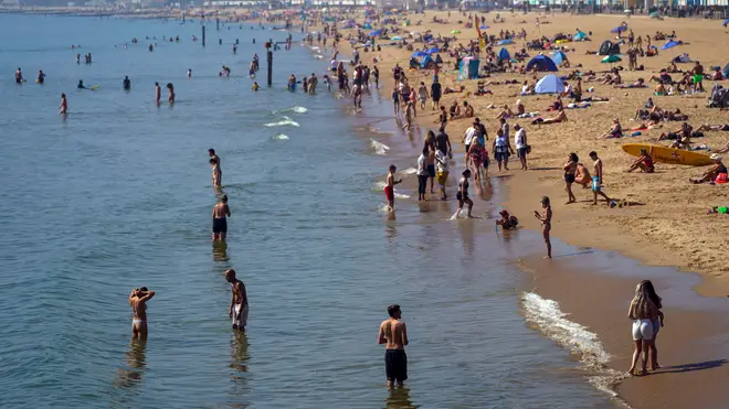 Brits enjoy the sunshine on Bournemouth beach on Monday