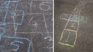 The kids used chalk to draw the traditional grid on the ground for game