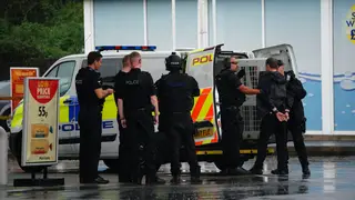 Armed police have detained a man after multiple people were held at knifepoint at a Bristol petrol station.