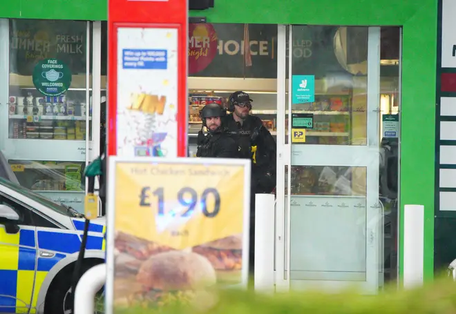 Armed police were seen in the Morrisons shop at the petrol station.