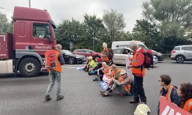 Around 18 protesters blocked traffic near the M25 today