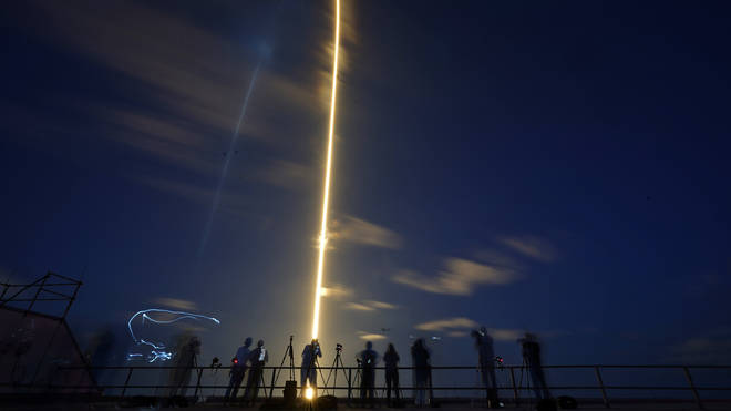 A SpaceX Falcon 9 rocket, with four private citizens onboard, lifts off in this time-exposure photo from Kennedy Space Centre’s Launch Pad 39-A