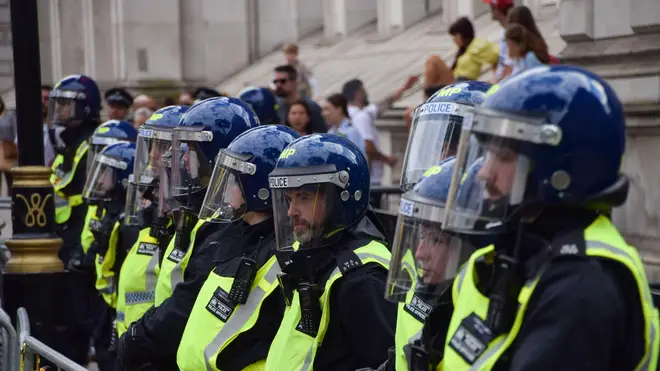 Police surrounded Downing Street as protesters arrived.