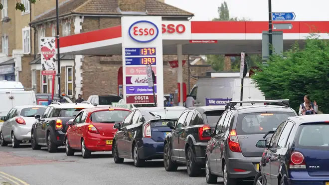 Motorists queue at an Esso petrol station