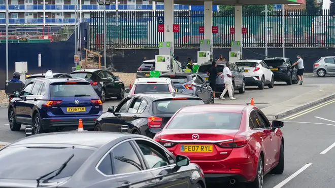 Cars queue for fuel at an Asda petrol station in south London