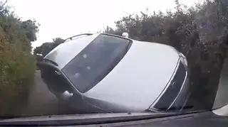 Shocking Moment Car Flips Onto Side After Speeding Down A Country Lane