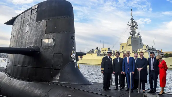Malcolm Turnbull and Emmanuel Macron on a submarine