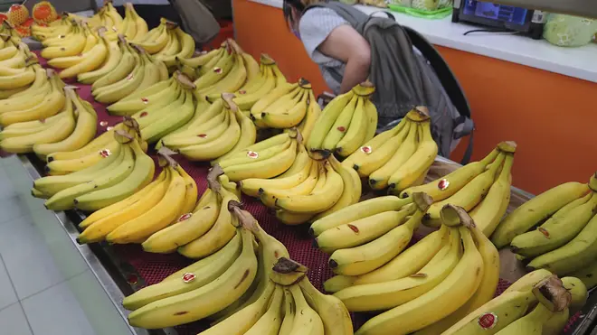 Taiwanese bananas for sale are on display at a fruit stall in Taipei, Taiwan (Chiang Ying-ying/AP)