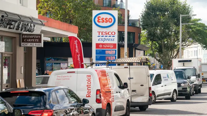 Vehicles queue for fuel at a petrol station in west London (Dominic Lipinski/PA)