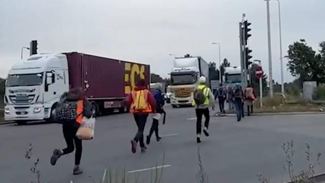 The eco protesters defied the court injunction to run onto the M25.