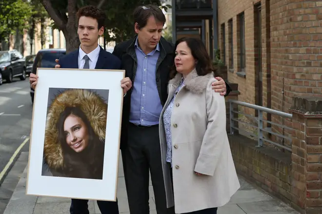 Nadim and Tanya Ednan-Laperouse, with their son Alex, outside West London Coroners Court, following the conclusion of the inquest into the death of Natasha
