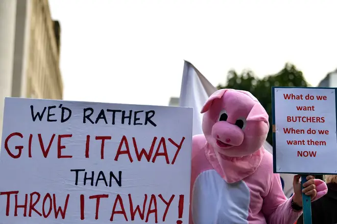 Protesters outside the Tory conference called for a visa scheme to bring more butchers to the UK
