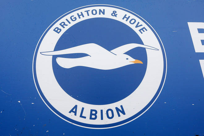 A Brighton and Hove Albion player has been arrested on suspicion of sexual assault.