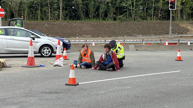 Insulate Britain protesters block J25 of the M25 this morning.