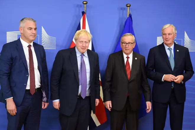 The UK's Stephen Barclay and Boris Johnson with the EU's Jean Claude Juncker and Michel Barnier after the Brexit deal agreement in October 2019
