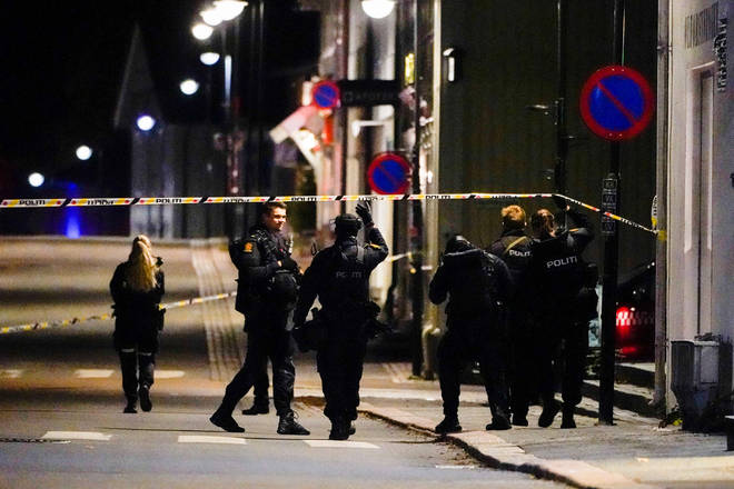 Police officers cordon off the scene in Kongsberg