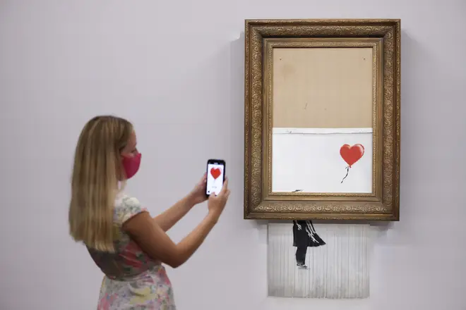 Banksy's Love Is In The Bin sold for over £18m