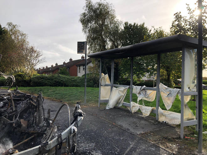 A bus stop was also badly damaged in the attack