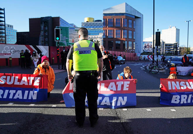 Protesters from Insulate Britain blocking Great Charles Queensway in Birmingham