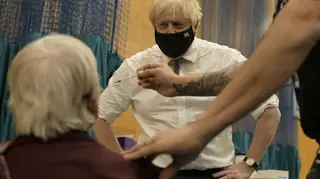 Boris Johnson watches 88-year-old Nitza Sarner received a Covid booster vaccine. Some 10 million people have now had a booster, the PM announced.