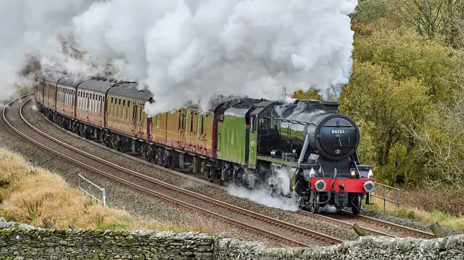 A steam train travels through Yorkshire Dales National Park