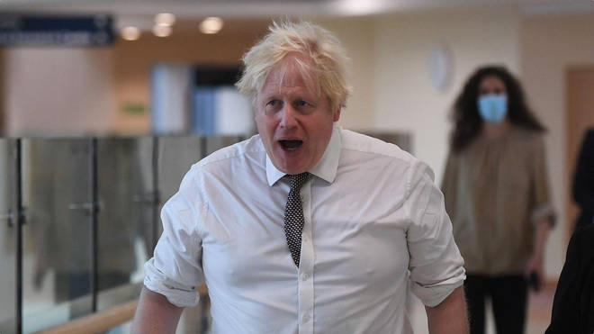 Boris Johnson was pictured maskless on his visit.