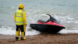 A jet-ski thought to have been used in a migrant crossing is brought in to Dungeness, Kent, by the RNLI after being intercepted in the Channel