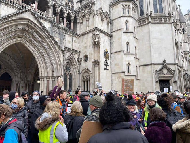 The group gathered outside the High Court before marching through the city