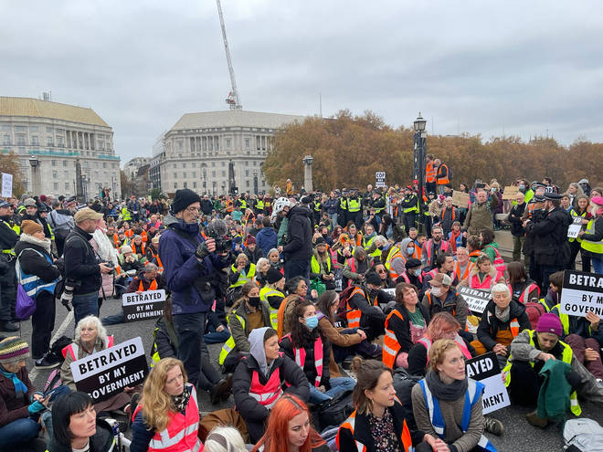 Hundreds of protesters have blocked Lambeth Bridge in London