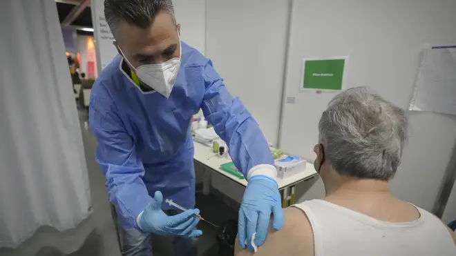 A man being vaccinated
