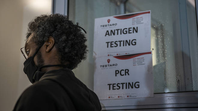 A person queues to be tested for Covid-19 in Johannesburg, South Africa