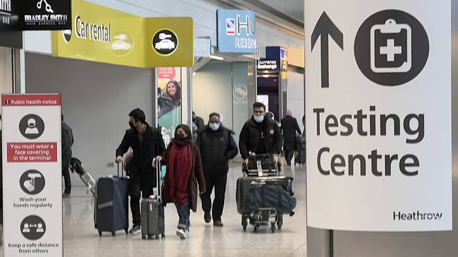 Passengers arrive at Heathrow Airport