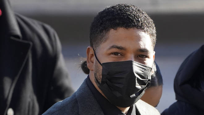 Actor Jussie Smollett arrives at court while wearing a face mask