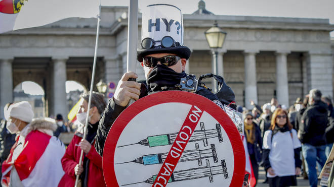 A man takes part in a demonstration against coronavirus restrictions in Vienna in Austria
