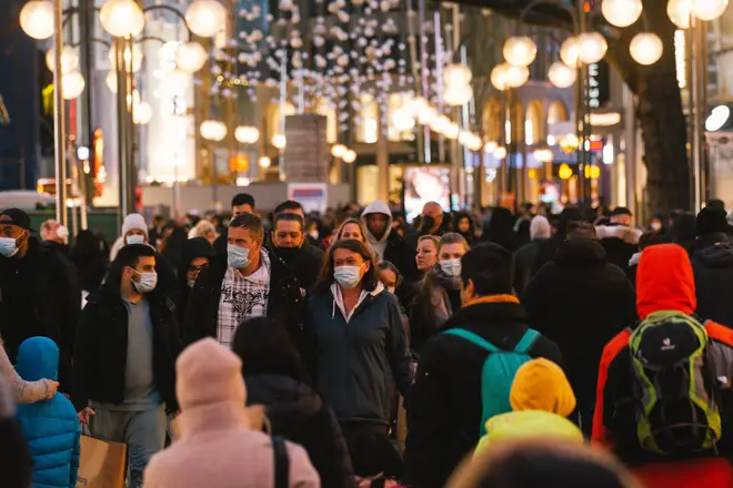 Shoppers in Cologne, as unvaccinated people in Germany are set to face new restrictions.