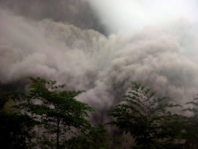 Video image released by Indonesia's National Disaster Management Agency (BNPB) shows Mount Semeru spewing volcanic materials in Lumajang, East Java, Indonesia.