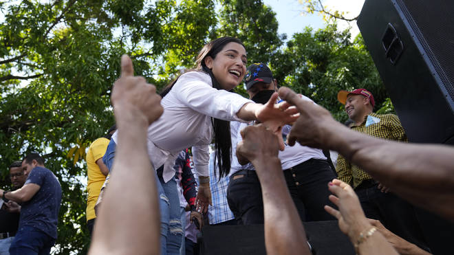 Aurora Silva greets supporters after she was named the new Democratic Unity Roundtable gubernatorial candidate for Barinas State (Ariana Cubillos/AP)