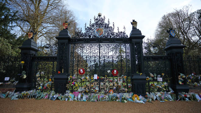 The Norwich Gates outside Sandringham House in Norfolk, adorned with tributes to Prince Philip Duke of Edinburgh