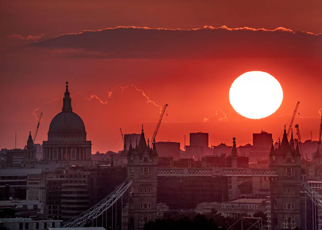 Dramatic evening sunset over St. Paul's Cathedral on one of the hottest days