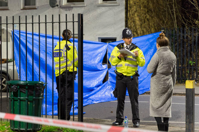 Emergency services at the scene in Sutton, south London, where four children who are believed to be related have died following a fire at a house.