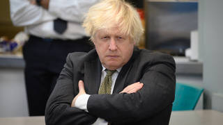 Boris Johnson, pictured on Friday, is under renewed pressure after a photo emerged of him and his wife in the Downing Street garden with up to 17 staff allegedly during the first national lockdown.
