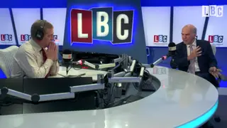 Nigel Farage speaks to Vince Cable
