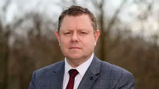John Apter has been suspended from his role.