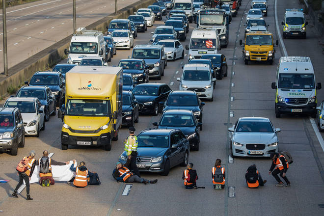 Insulate Britain climate activists bring the M25 to a standstill near Ockham in September.