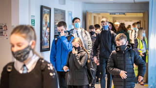 School pupils have been asked to wear face masks in class